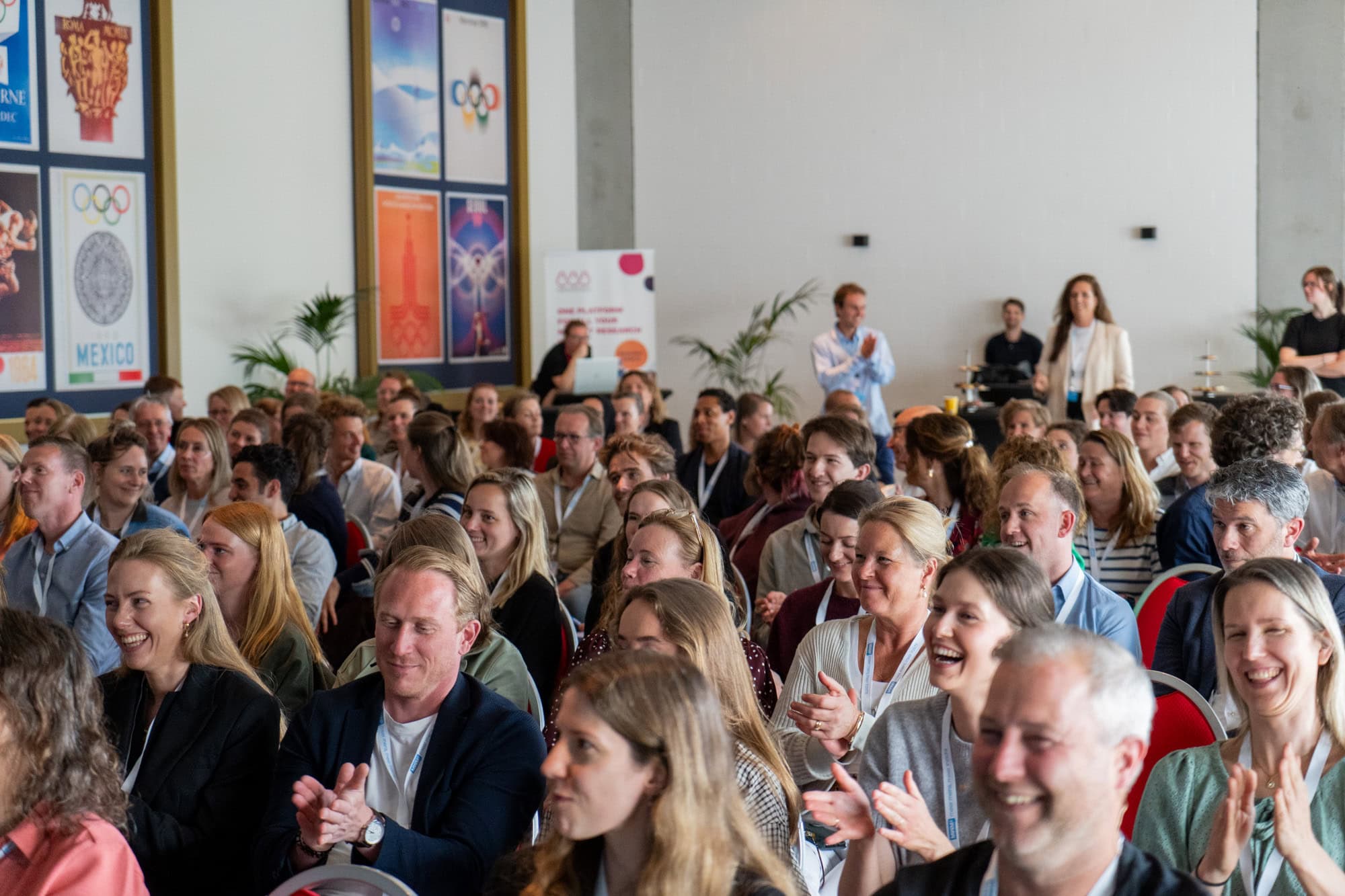 Publiek tijdens een onderzoeksevent in Amsterdam